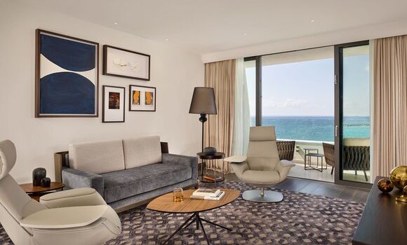 The Signature Suite Sea View king bed