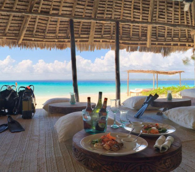 Фото Mnemba Island Lodge 8