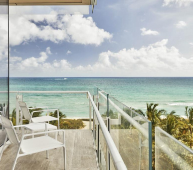 Фото Four Seasons Hotel at he Surf Club 11