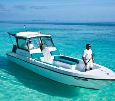 Фото Soneva Fushi (, Мальдивские острова) 11